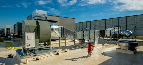 Rooftop HVAC with chillers and VRV refrigeration units.